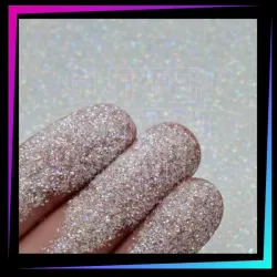 Paillettes cosmétiques Poussière de Fée  translucides à effet holographique pour tatouages pailletés et maquillage corporel.